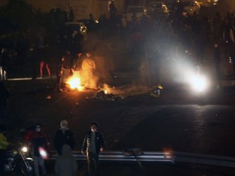 Tahran'da Devlete Ait Binalar Ateşe Verildi
