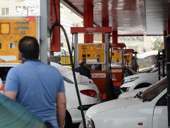 İran'da Benzin Zammından Elde Edilen Gelirin Bir Kısmı Halka Dağıtılacak
